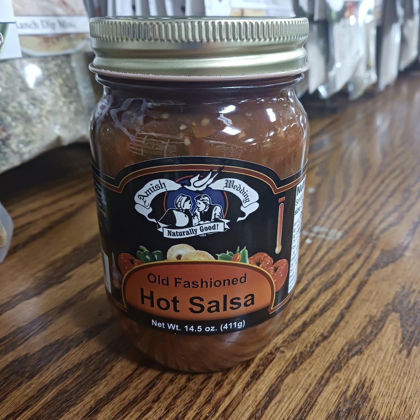 Handcrafted Amish-style hot salsa in a glass jar with thick, chunky texture, made in USA, perfect for Kitchen & Food, Food, Snacks and Sweets, Pantry, USA Made, Best Sellers, and Promo Eligible collections.