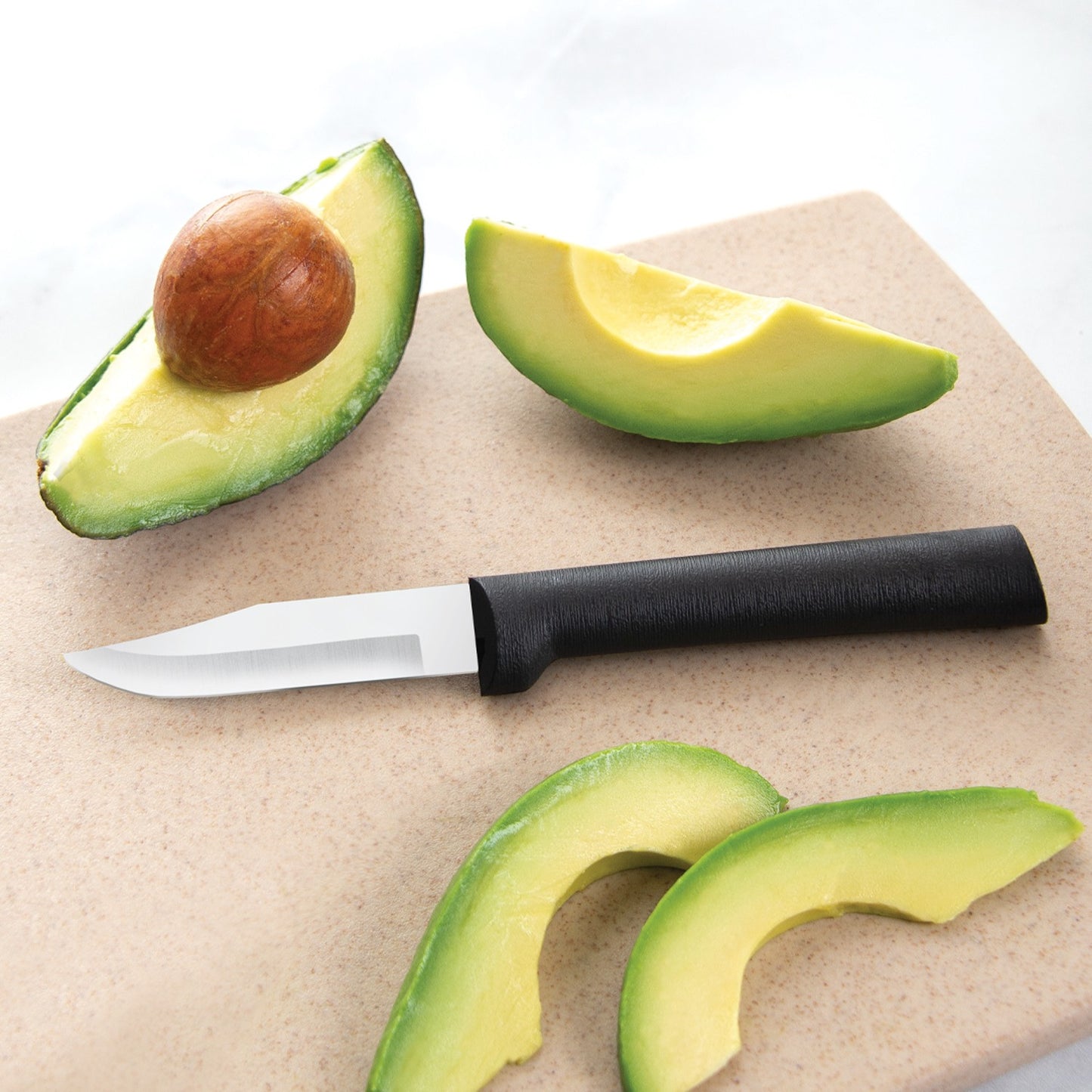 Small paring knife with a smooth black handle and sharp non-serrated blade, ideal for precise peeling and cutting of fruits like avocado, part of USA made kitchen and food prep collections.