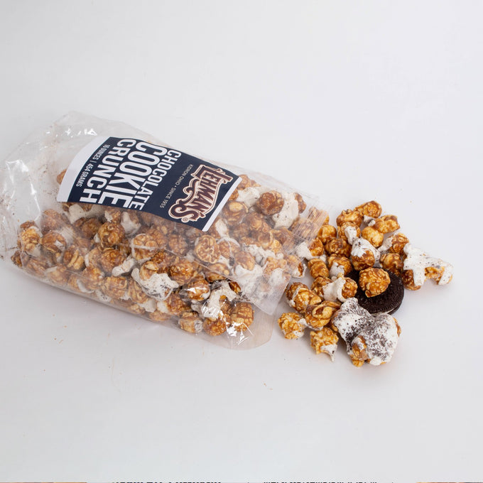 Clear bag of handcrafted caramel popcorn mixed with chocolate cookie crunch pieces, a unique Amish-made sweet and crunchy snack from USA, perfect for Kitchen & Food, Snacks and Sweets, Popcorn, USA Made, Best Sellers, and Promo Eligible collections.