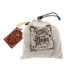 Soft drawstring bag with festive "Believe in the Magic" lettering, containing handcrafted Santa’s reindeer ornament bells, ideal for Home & Decor, Holiday Decor, Best Sellers, and Sale collections.