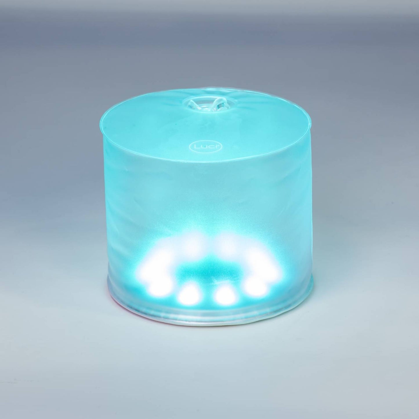 Inflatable solar LED light glowing with bright blue illumination, designed for eco-friendly camping, emergency preparedness, and outdoor use in farm, garden, and lighting collections.