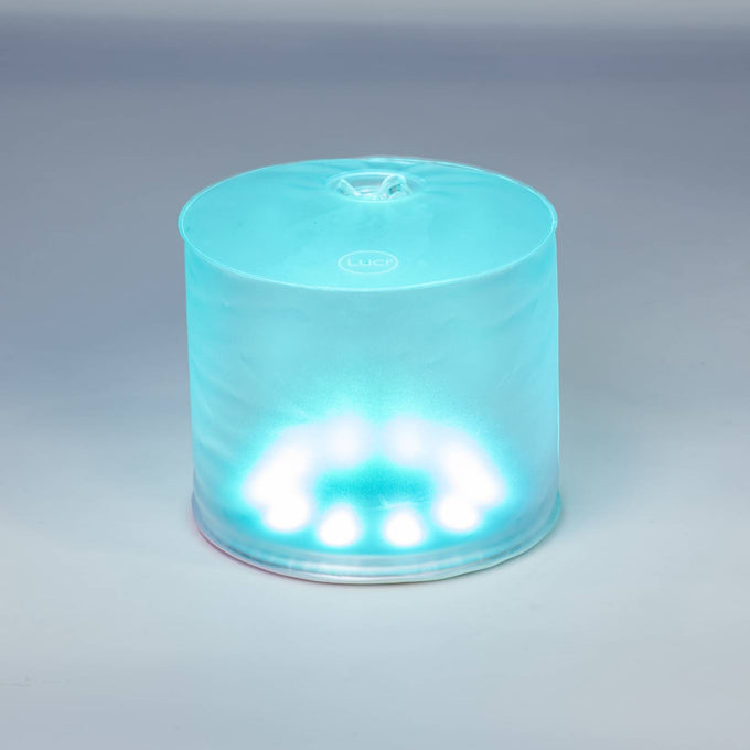 Inflatable solar LED light glowing with bright blue illumination, designed for eco-friendly camping, emergency preparedness, and outdoor use in farm, garden, and lighting collections.