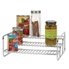 Chrome wire 3-tier rack with cans, a glass spice jar, and a jar of olives, designed for pantry organization and included in Kitchen & Food, Kitchen Gadgets, Kitchen Accessories, Storage and Serving collections.