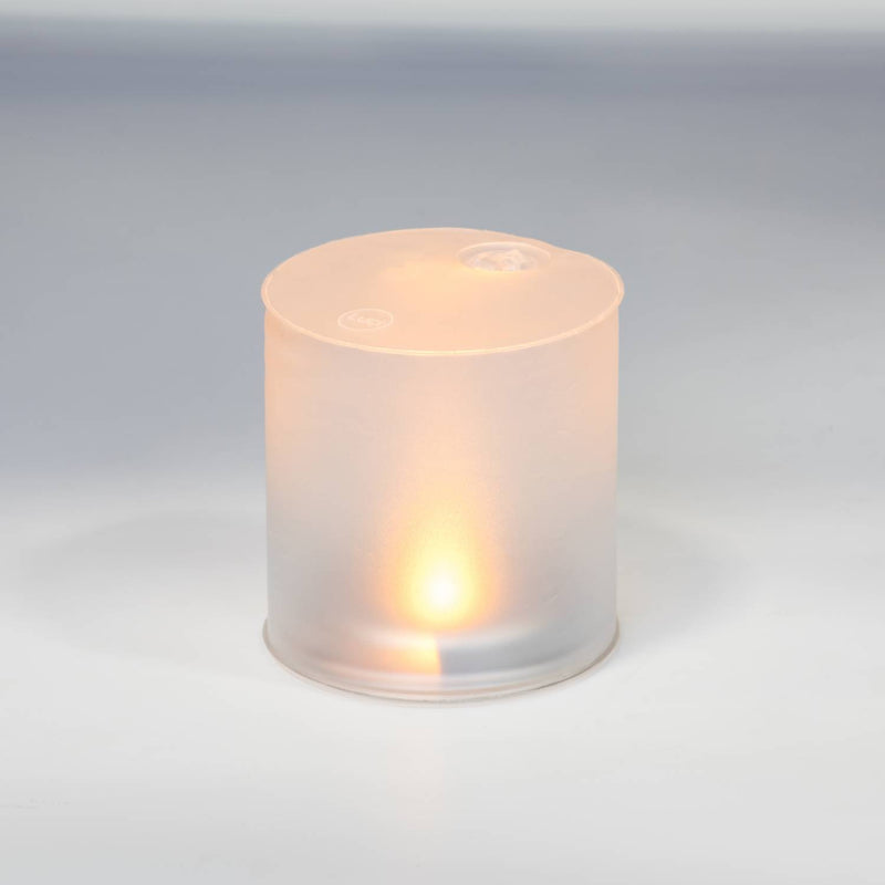 Portable inflatable solar LED candle emitting a warm flickering light, designed for safe use outdoors and indoors, perfect for camping, emergency supplies, and lighting collections.