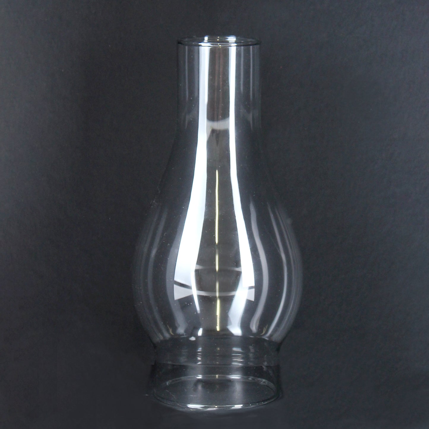 Clear glass oil lamp chimney with a 2-7/8 inch base and 4-inch bulge, designed for lamps, lighting, parts and accessories, chimneys and globes, in best sellers and promo eligible categories.