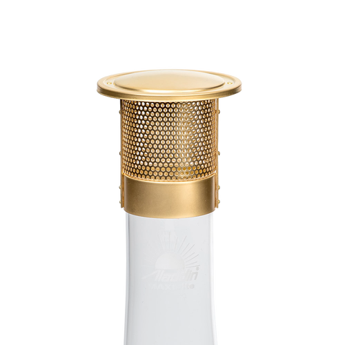Brass-colored metal heatshield with perforated sides and solid top dome, designed to fit atop an oil lamp chimney to protect mantles and repel insects, featured in Lamps & Lighting, Parts and Accessories, Wicks and Mantles, Best Sellers, and Promo Eligible collections.