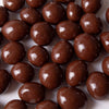 Close-up of glossy milk chocolate covered peanuts made with sugar-free chocolate, a handcrafted treat ideal for Kitchen & Food, Snacks and Sweets, Candy, USA Made, and Best Sellers collections.