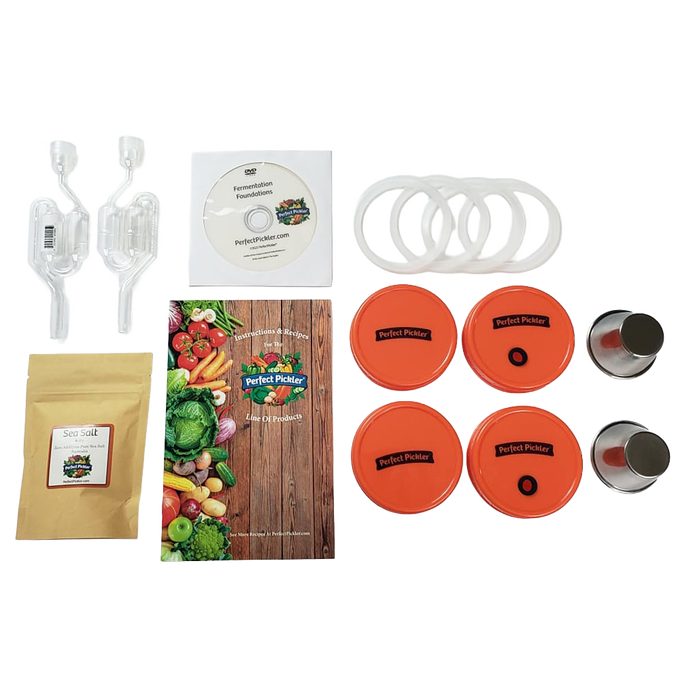 Handcrafted fermenting kit featuring two jar-top fermentors with orange lids, airlocks, gaskets, salt packet, and recipe guide, designed for Kitchen & Food, Food Preservation, and USA Made collections.