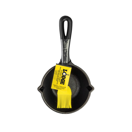 Seasoned cast iron melting pot with black handle and bright yellow silicone basting brush, designed for even heating and heat retention, ideal for Kitchen & Food, Cookware, and Cast Iron collections.