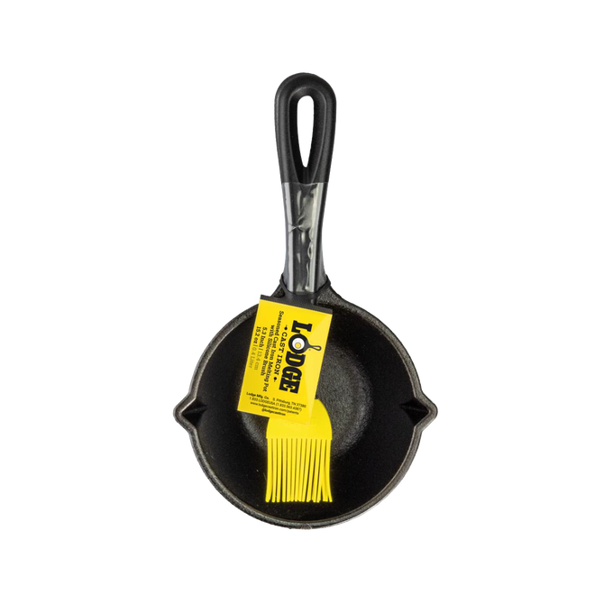 Seasoned cast iron melting pot with black handle and bright yellow silicone basting brush, designed for even heating and heat retention, ideal for Kitchen & Food, Cookware, and Cast Iron collections.