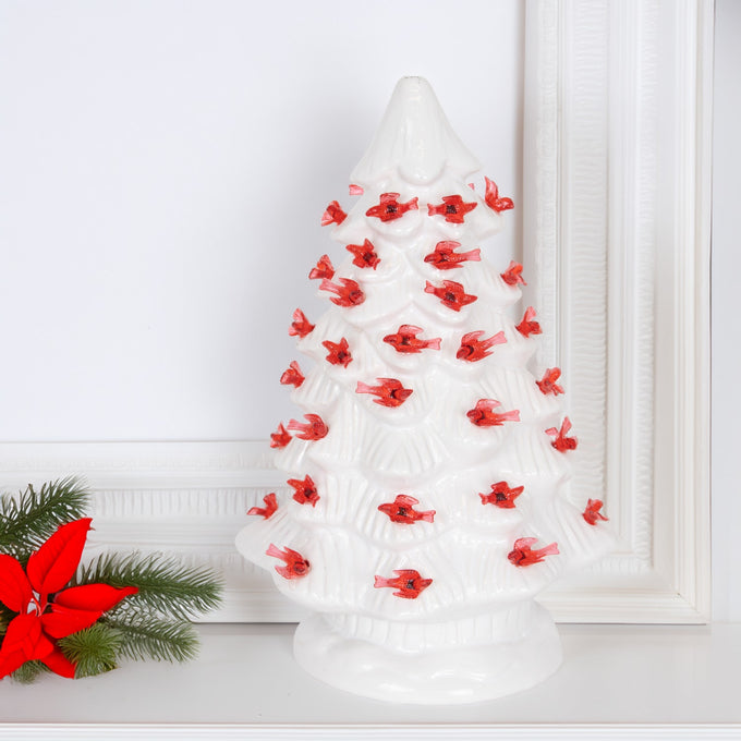 Handcrafted ceramic Christmas tree decorated with bright red cardinals and warm LED lights, adding timeless charm to holiday decor in Home & Decor, Holiday Decor, Best Sellers, Promo Eligible collections.