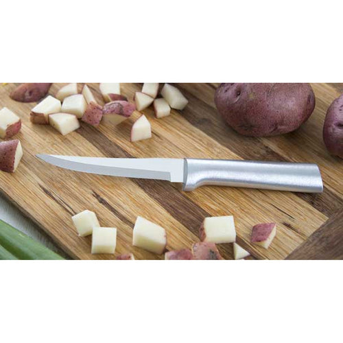 Handcrafted knife with a high carbon surgical stainless steel blade and solid aluminum handle, slicing red potatoes on a wooden cutting board for kitchen and food prep.
