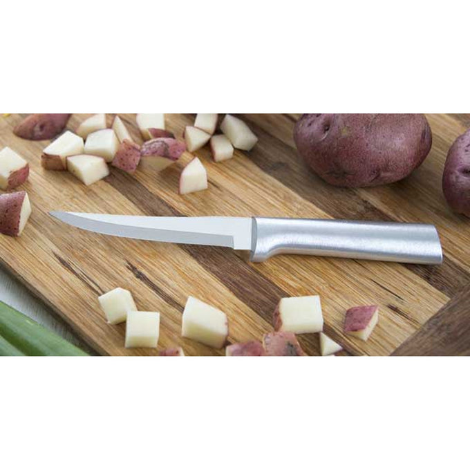 Handcrafted knife with a high carbon surgical stainless steel blade and solid aluminum handle, slicing red potatoes on a wooden cutting board for kitchen and food prep.