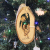 Handcrafted olive wood ornament featuring a bark slice with a nativity scene and palm silhouette, perfect for Home & Decor, Holiday Decor, Best Sellers, and Promo Eligible collections.