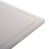 Close-up of a durable high-density plastic cutting board with a grooved edge to catch juices, designed for efficient food prep, featured in Kitchen & Food and Best Sellers collections.