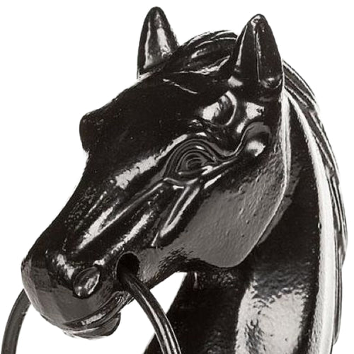 Glossy black cast iron horse head sculpture with detailed facial features and a sturdy steel ring in its mouth, ideal for adding rustic charm to home and garden decor.