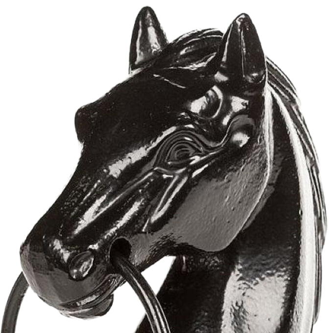 Glossy black cast iron horse head sculpture with detailed facial features and a sturdy steel ring in its mouth, ideal for adding rustic charm to home and garden decor.