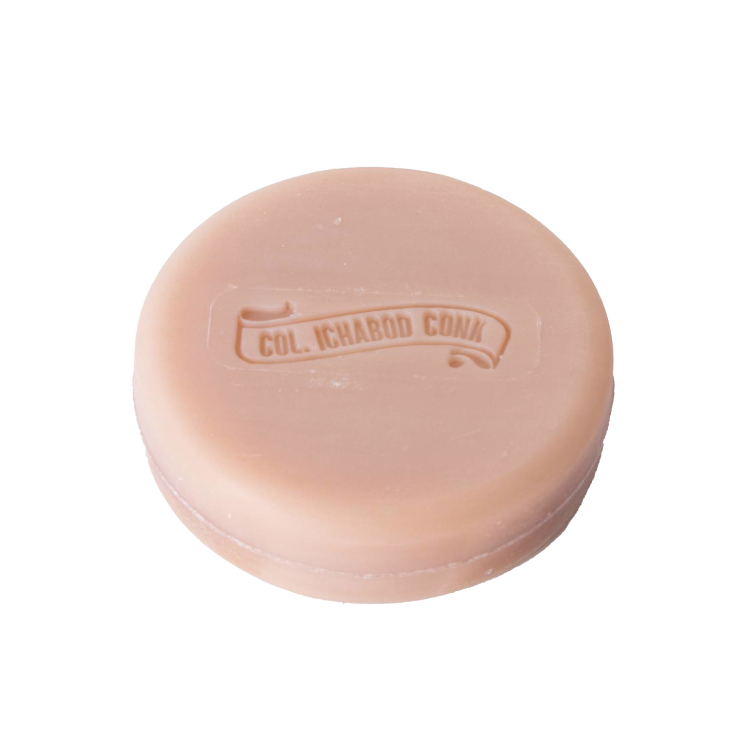 Large round shaving soap bar with embossed logo in soft almond hue, handcrafted in USA, nourishing with shea butter, avocado oil, and vitamin E. Part of Health & Wellness, Grooming and Personal Hygiene, Soaps and Soapmaking, USA Made, Best Sellers, and Promo Eligible collections.