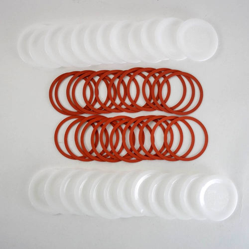 Set of reusable regular-sized canning jar lids and red sealing rings, handcrafted and made in USA, ideal for Kitchen & Food, Food Preservation, and Canning collections.