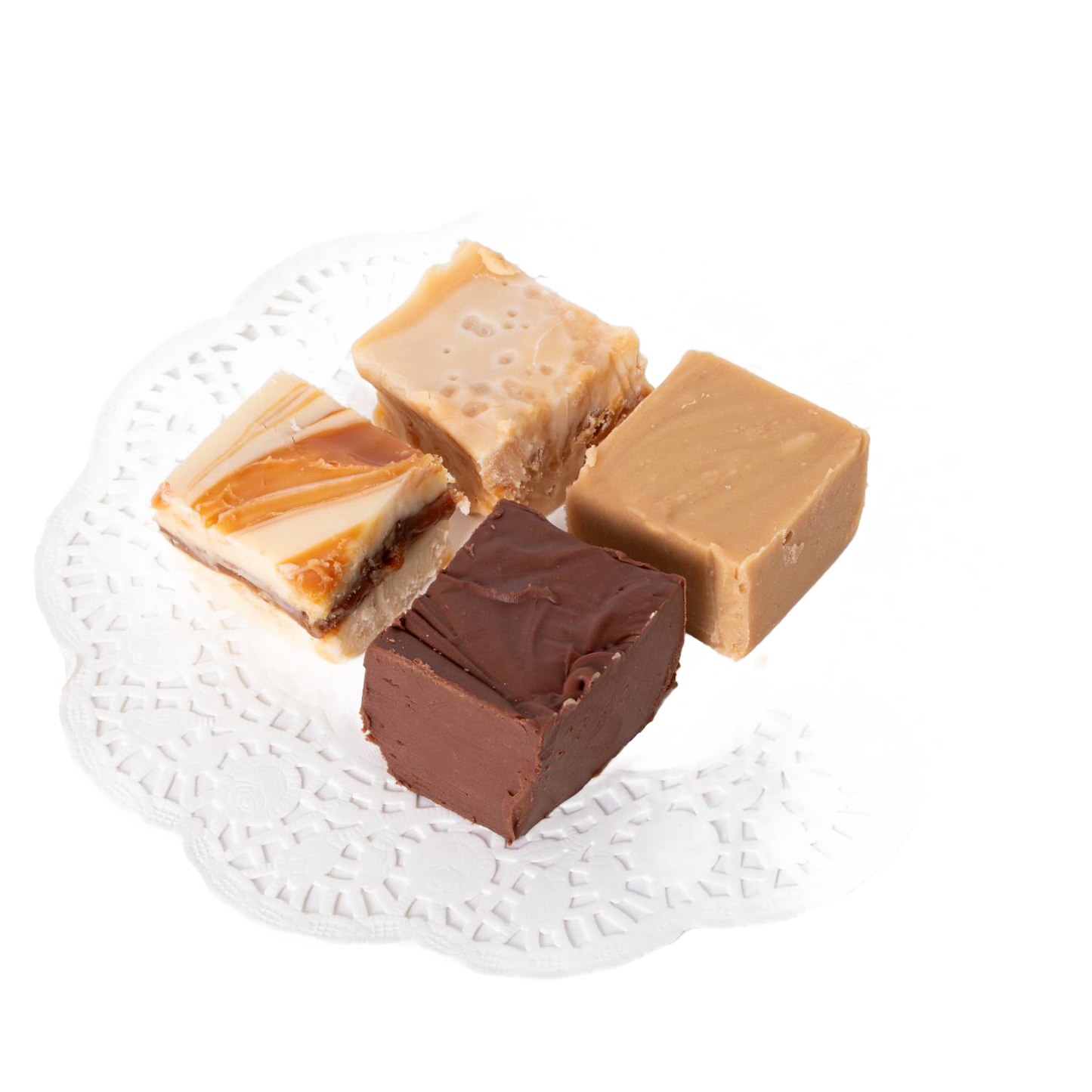 Four handcrafted creamy fudge squares in assorted flavors arranged on a white decorative paper doily, featured in Kitchen & Food and USA Made snack collections.