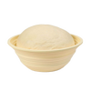 Light beige collapsible bread proofing basket with concentric ridges holding a round dough ball, designed for effective rising and compact storage in Kitchen & Food and Baking Supplies collections.
