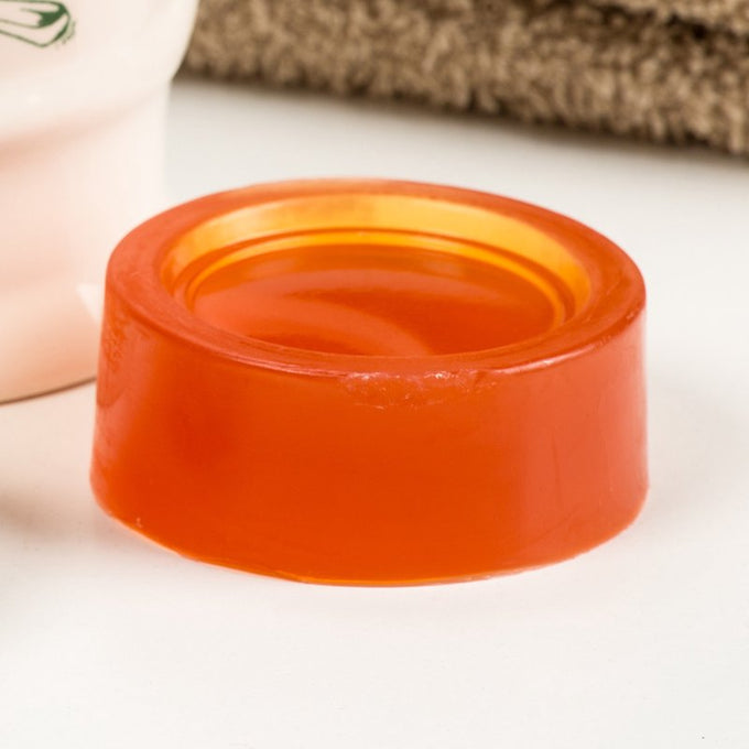 Amber-colored large shaving soap puck with moisturizing ingredients like shea butter, avocado oil, and vitamin E, handcrafted in USA, ideal for Health & Wellness, Grooming, and Soaps collections.