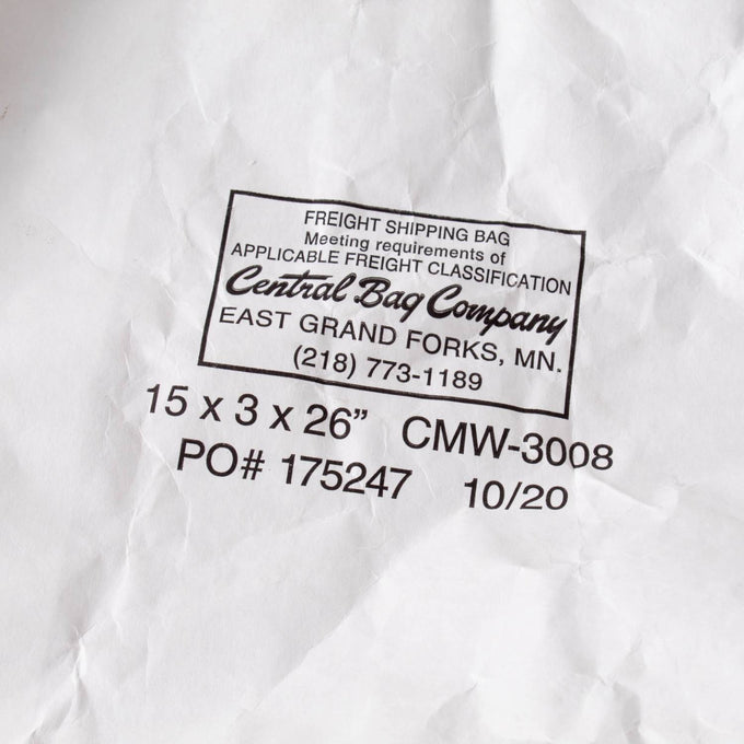 Close-up of a white freight shipping bag with printed text from Central Bag Company, suitable for use in Farm, Garden & Tool, and Pantry collections.