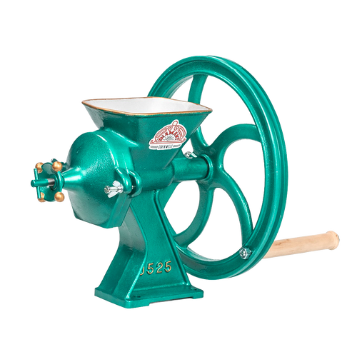 Cast iron grain mill with large grinding wheel and wooden handle, designed for fast, fine milling of various grains, featured in Kitchen & Food and Baking Supplies collections.