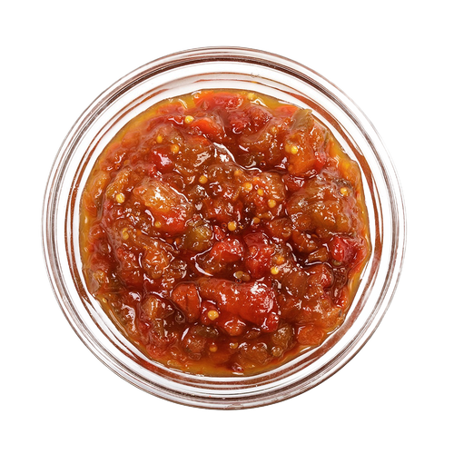Top-down view of a jar filled with chunky red sweet pepper relish featuring visible seeds and pieces, handcrafted in USA and ideal for enhancing sandwiches and appetizers, featured in Kitchen & Food, Snacks and Sweets, Pantry, USA Made, Best Sellers, and Promo Eligible collections.