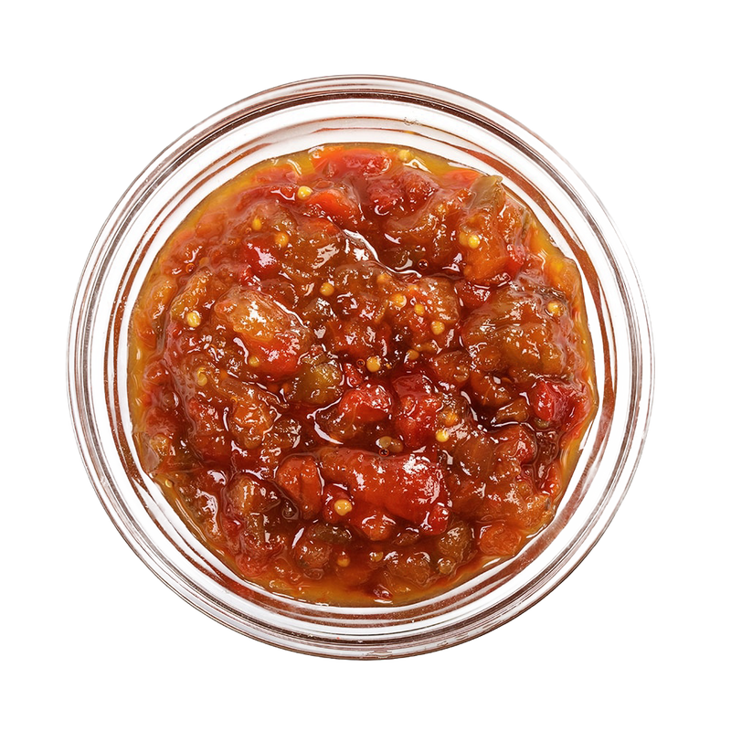 Top-down view of a jar filled with chunky red sweet pepper relish featuring visible seeds and pieces, handcrafted in USA and ideal for enhancing sandwiches and appetizers, featured in Kitchen & Food, Snacks and Sweets, Pantry, USA Made, Best Sellers, and Promo Eligible collections.