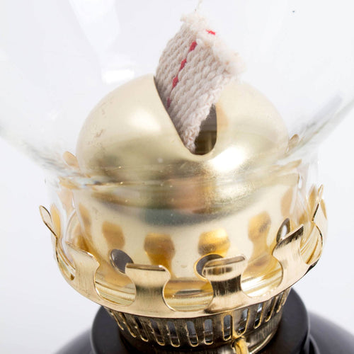 Close-up of a handcrafted brass burner with wick and clear glass chimney on a vintage-style lamp, featured in Farm, Garden & Tool, Emergency Supplies, Best Sellers, and Promo Eligible collections.