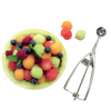 Metal scoop with a spring release mechanism alongside colorful melon balls and fresh berries in a melon bowl, perfect for Kitchen & Food, Cookware, Baking Supplies, and Kitchen Gadgets collections.