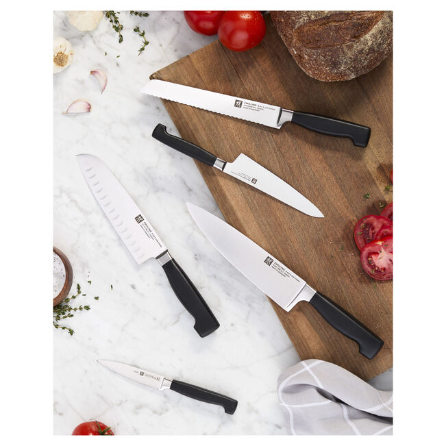 ZWILLING Four Star 5.5-Inch Hollow-Edge Santoku Knife