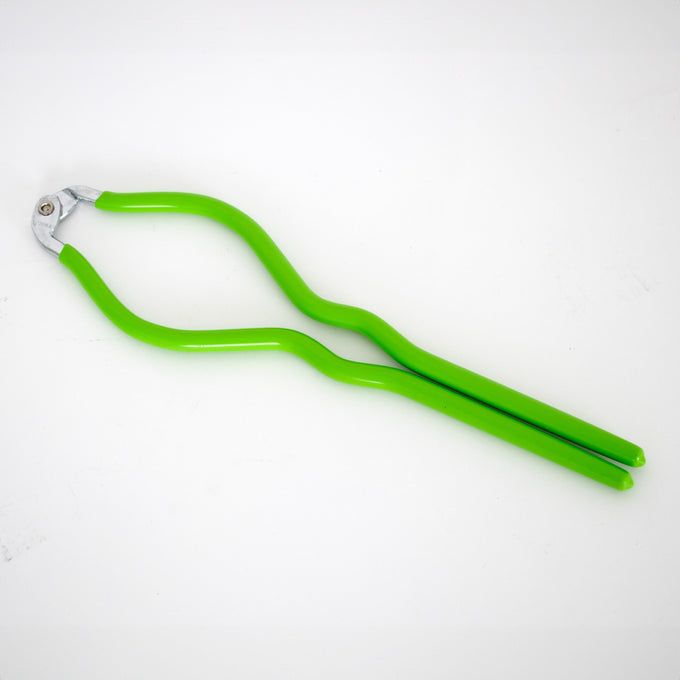 Handcrafted green vinyl-handled jar lifter with bent metal gripping arms designed for safe and slip-resistant use in Kitchen & Food, Food Preservation, and Canning collections.