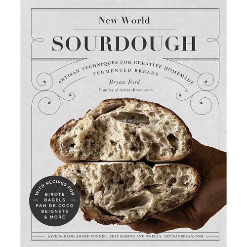 Cover of a cookbook titled New World Sourdough featuring a rustic loaf of sourdough bread cut open to reveal its airy crumb, ideal for cookbooks, best sellers, and home and garden how-to books.