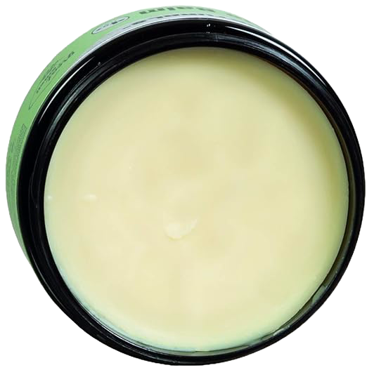 Open black jar with pale yellow natural balm inside, labeled with green accents for a soothing muscle and joint remedy made in USA, featured in Health & Wellness and Best Sellers collections.