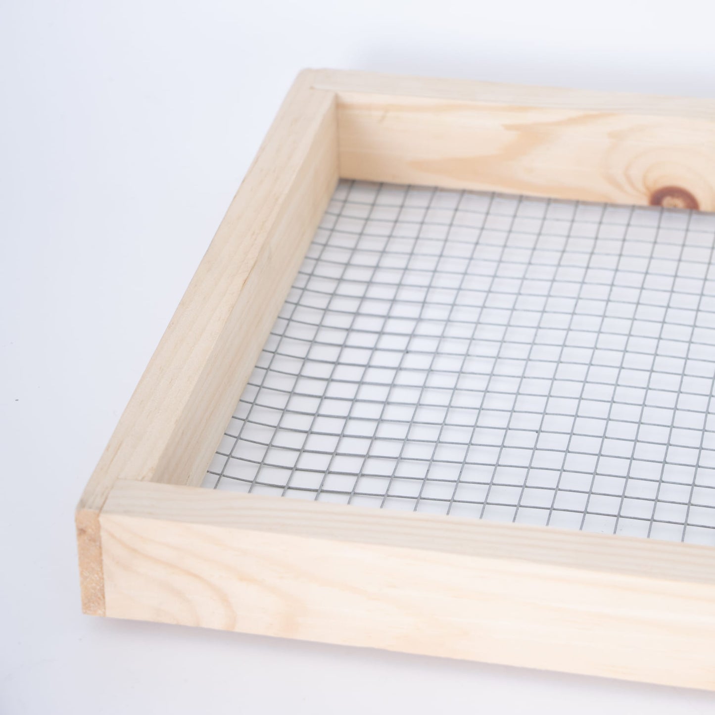Handcrafted wooden 8-frame candy board feeder with wire mesh, Amish made in the USA, designed for beekeeping supplies and included in farm, garden, and tool collections.