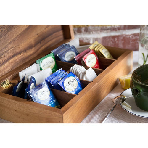 Handcrafted Acacia wood tea box with ten compartments holding assorted tea bags, shown open on a table near a teapot and spoon, perfect for Kitchen & Food and Brewing Coffee and Tea collections.
