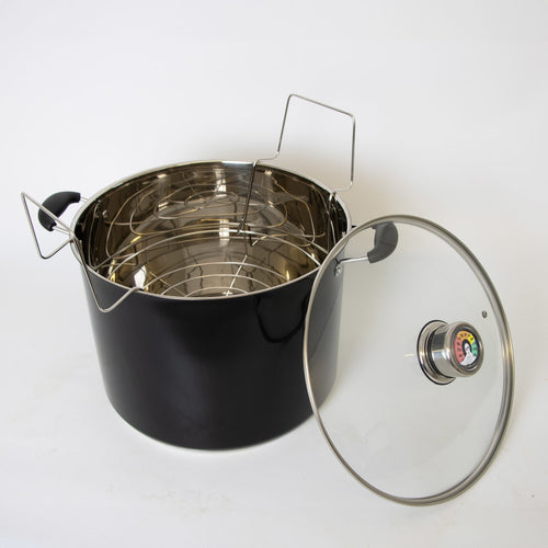Black 21.5-quart water bath canner with stainless steel interior and wire rack, featuring a glass lid with built-in temperature gauge, ideal for Kitchen & Food, Canning, and Food Preservation collections.