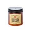 Amber glass jar of handcrafted foot soak with black lid, made in USA, featured in Health & Wellness, Health Remedies, Grooming and Personal Hygiene, and Best Sellers collections.