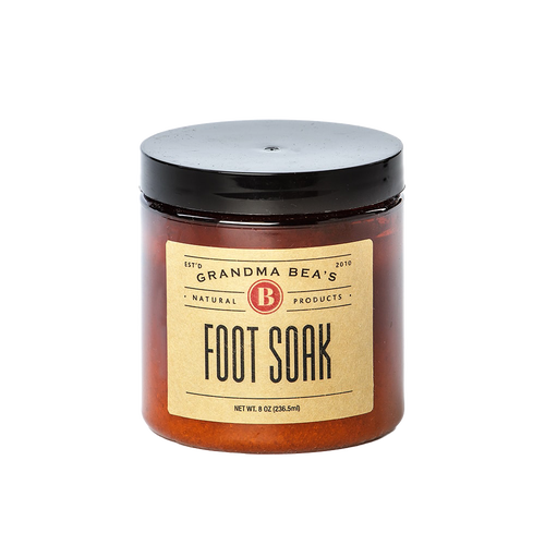 Amber glass jar of handcrafted foot soak with black lid, made in USA, featured in Health & Wellness, Health Remedies, Grooming and Personal Hygiene, and Best Sellers collections.