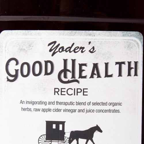 Close-up of a handcrafted health tonic label featuring a blend of organic herbs, raw apple cider vinegar, and juice concentrates, made in USA and part of Health & Wellness collections.