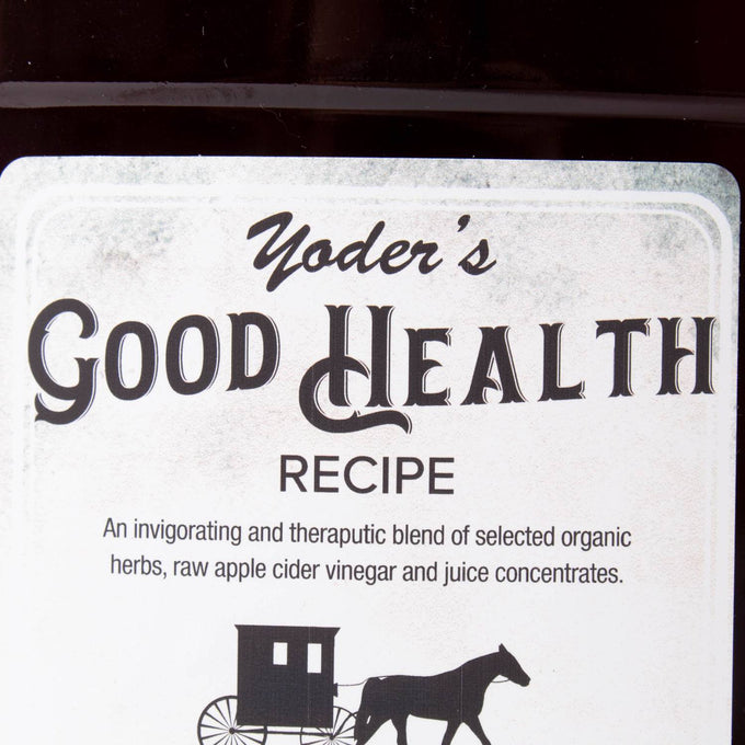 Close-up of a handcrafted health tonic label featuring a blend of organic herbs, raw apple cider vinegar, and juice concentrates, made in USA and part of Health & Wellness collections.