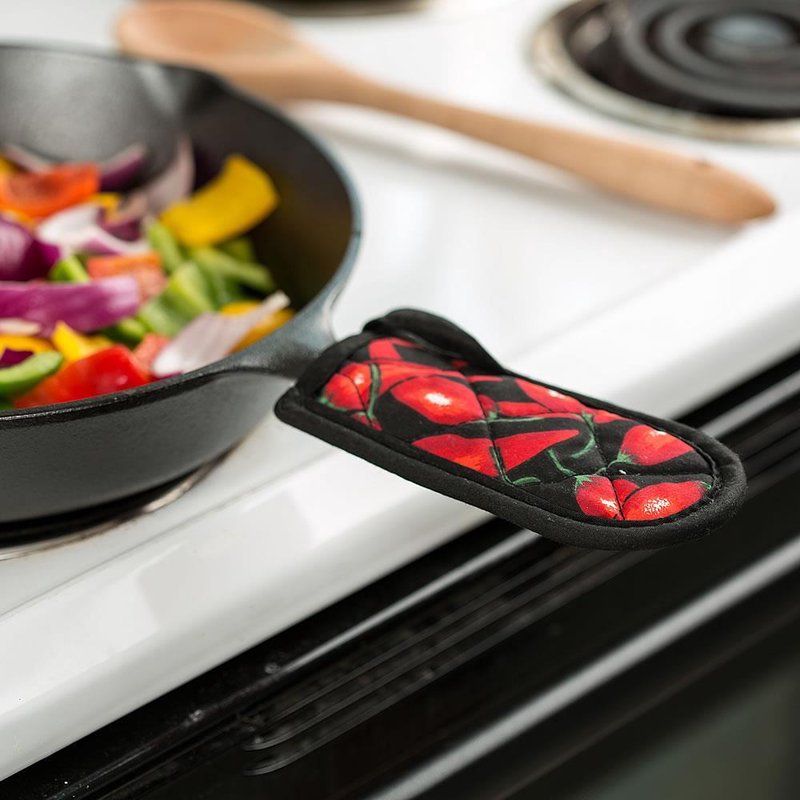 Single quilted hot handle pad featuring red chili pepper design with black trim, providing heat protection up to 350°F on cast iron pan handles, ideal for Kitchen & Food, Cookware, Cast Iron, Best Sellers, and Promo Eligible collections.
