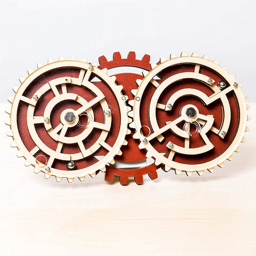 Handcrafted wooden puzzle featuring two interlocking gear mazes with metal balls, designed as a challenging brainteaser in Toys, Books & Games, Children's Toys, Games and Puzzles, and Best Sellers collections.