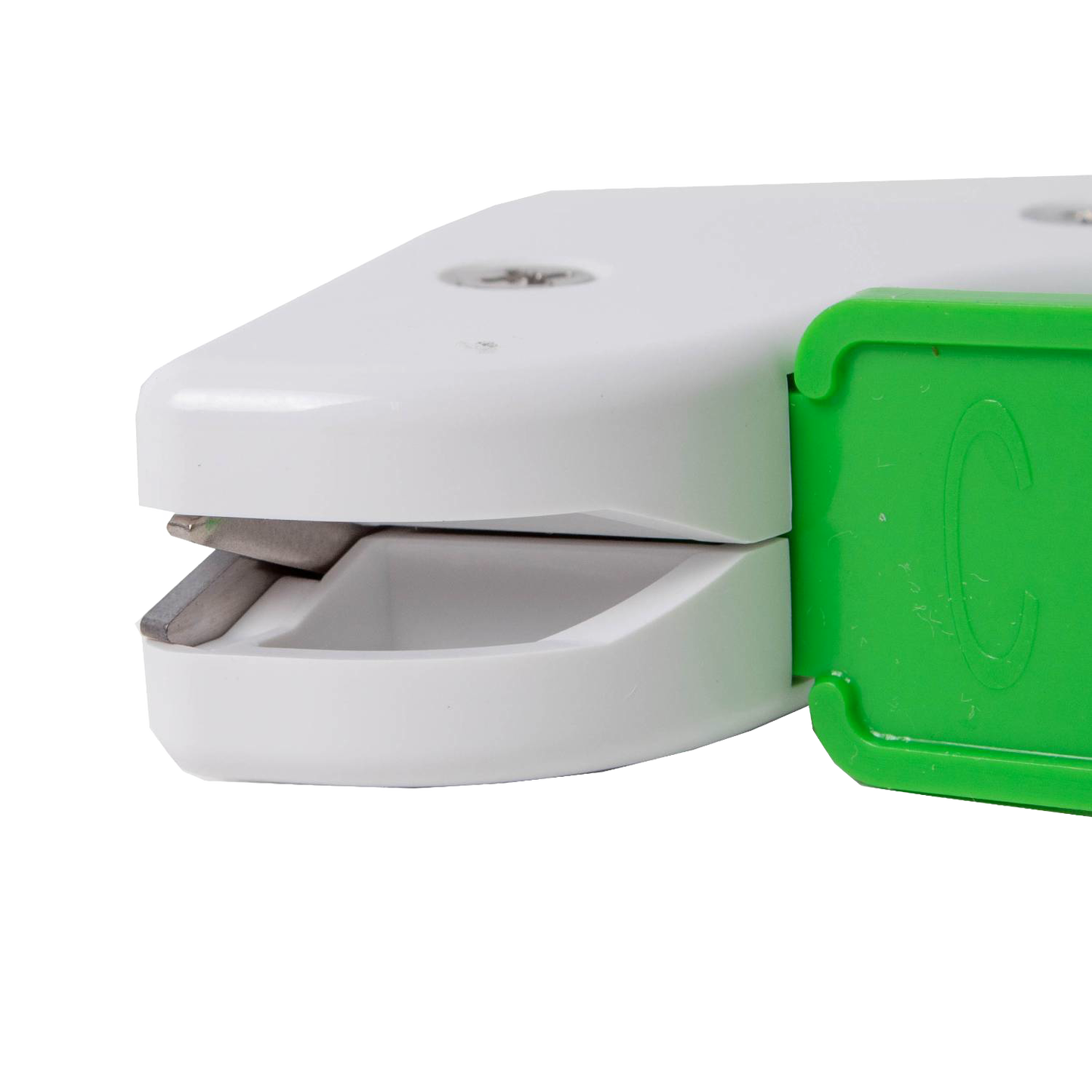Compact garden tool sharpener with a white body and green handle, featuring a reversible diamond-honed tungsten carbide edge, made in USA for Farm, Garden & Tool and Lawncare collections.