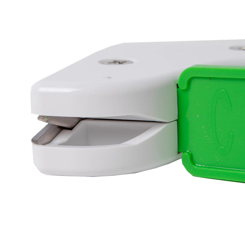 Compact garden tool sharpener with a white body and green handle, featuring a reversible diamond-honed tungsten carbide edge, made in USA for Farm, Garden & Tool and Lawncare collections.