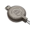 Round cast iron pie iron with textured surface and long metal handle with wood grips, handcrafted for durable outdoor use in camping, farm, and garden tool collections.