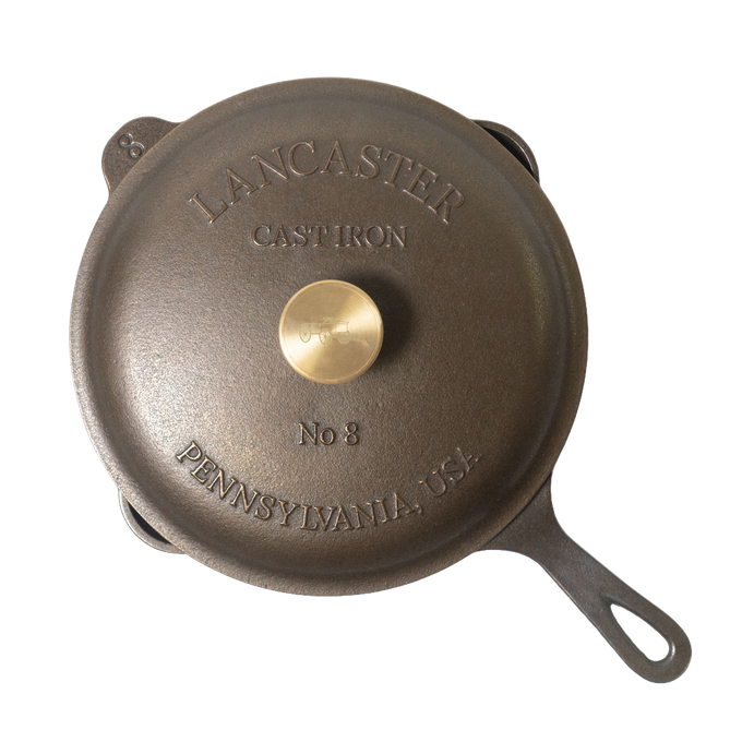 Top view of a handcrafted, Amish-made cast iron skillet lid with solid brass knob, embossed with "Lancaster Cast Iron No 8 Pennsylvania USA," ideal for Kitchen & Food, Camping, and USA Made collections.