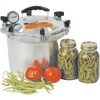 High-quality pressure canner with pressure gauge and clamp lid, accompanied by fresh tomatoes, green beans, and two jars of preserved green beans, highlighting food preservation in Kitchen & Food collections.